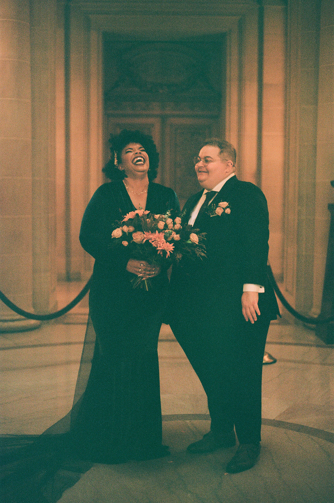 a couple having their wedding ceremony at san francisco city hall 