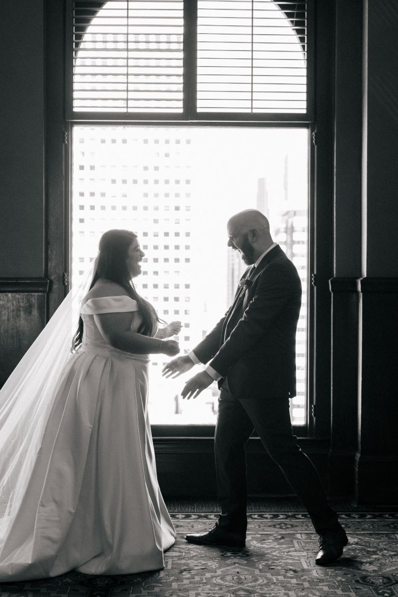a couple sharing a first look at the University Club of San Francisco