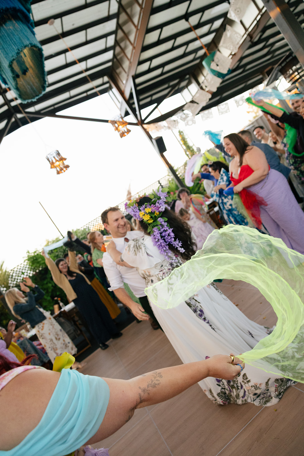 a couple dancing together at their wedding reception at nido's backyard 