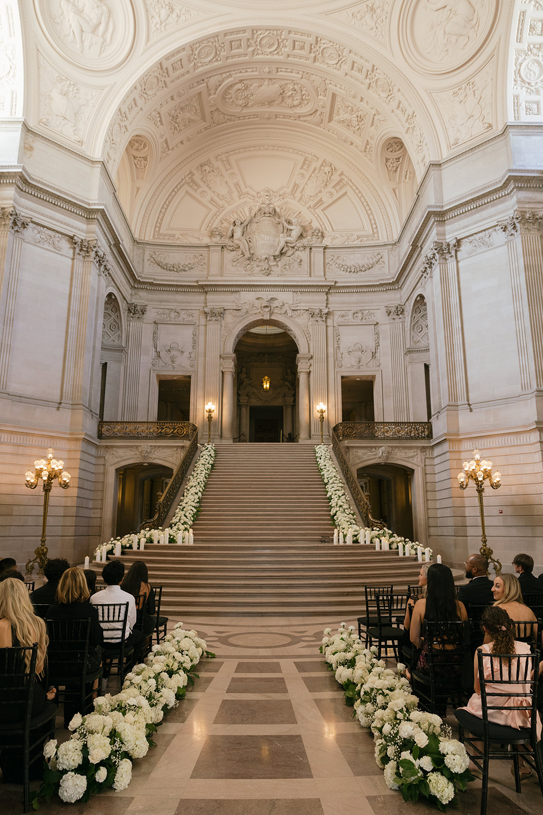 the interior of san francisco city hall set up for a wedding 